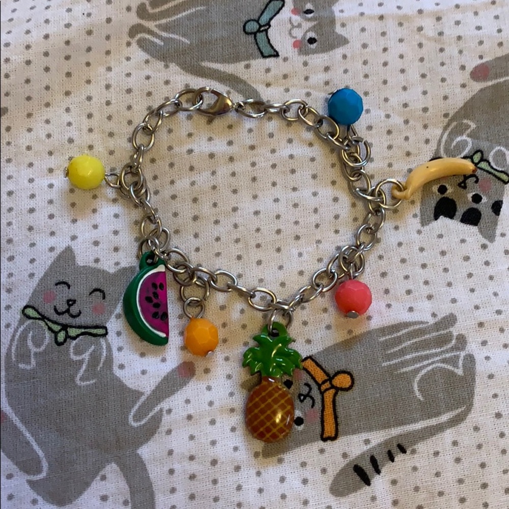 Fruit and charm bracelet